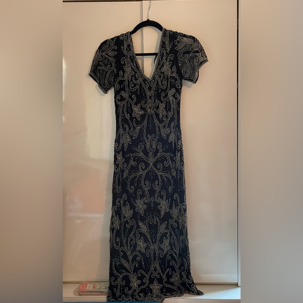 “Vintage” Black short sleeve beaded dress.